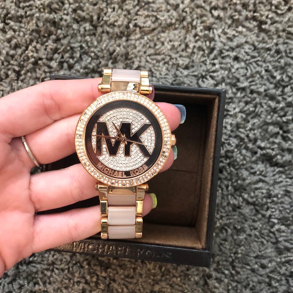 Rose gold Michael Kors watch with extra links
